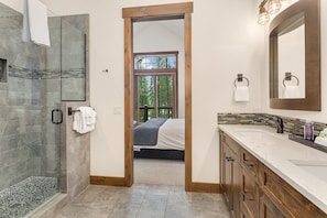 Combined shower/bathtub, towels, soap, shampoo