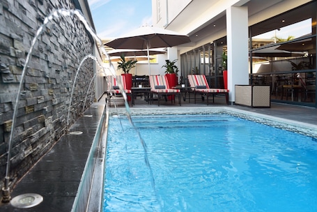 Outdoor pool, sun loungers