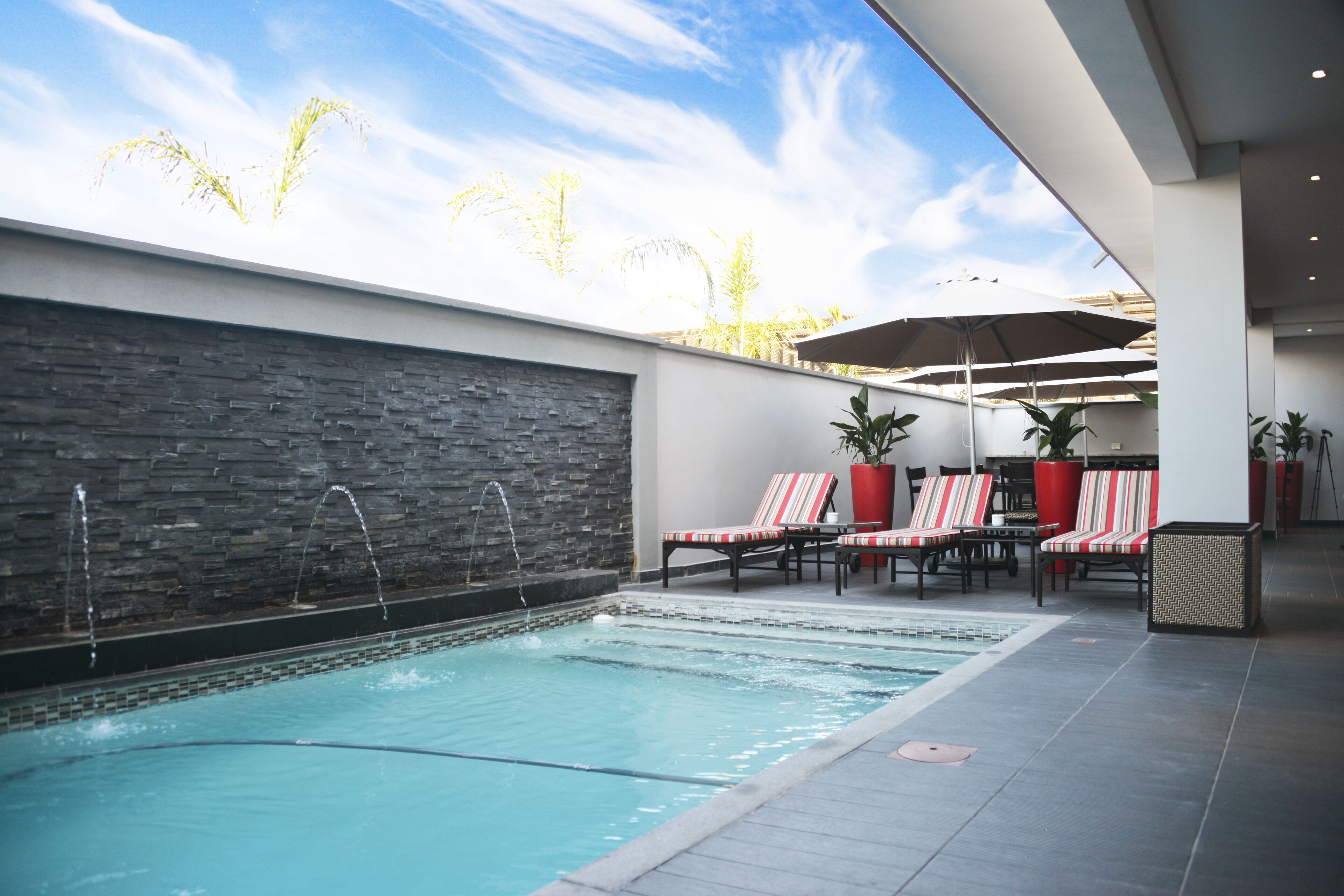 outdoor pool, pool loungers