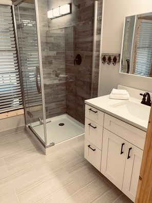 Bathtub, jetted tub, hair dryer, towels