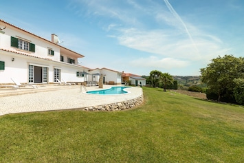 The terrace with a great view on the pool, garden and BBQ area below