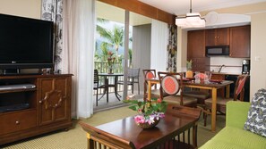 Una televisión, un reproductor de DVD, libros