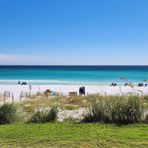 STEPS TO THE BEACH! 1st floor end unit with amazing views! 