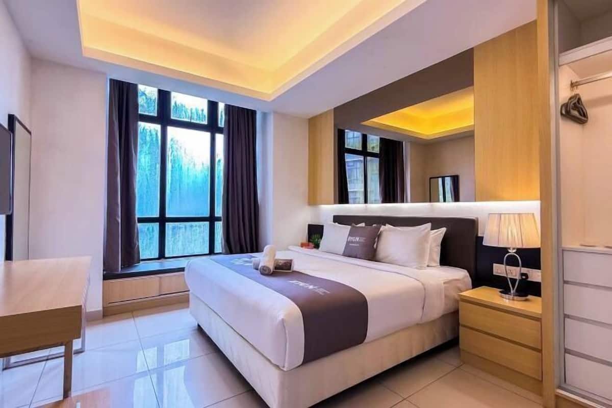 Desk, blackout drapes, iron/ironing board, bed sheets