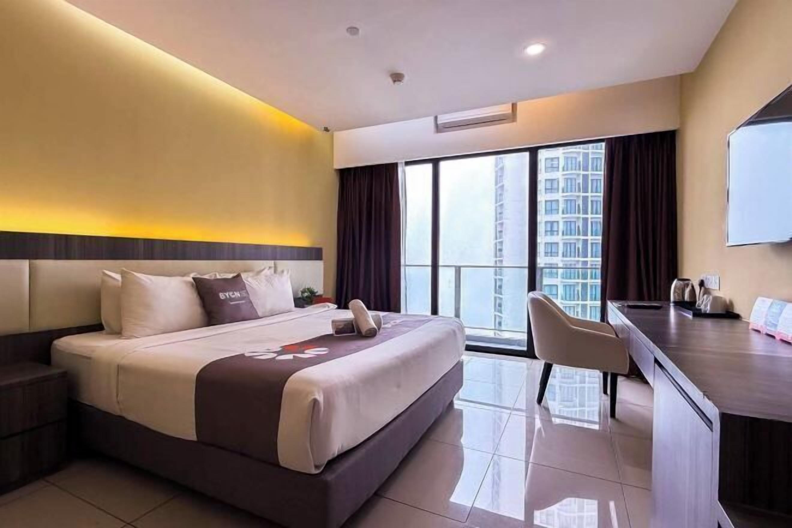 Desk, blackout drapes, iron/ironing board, bed sheets