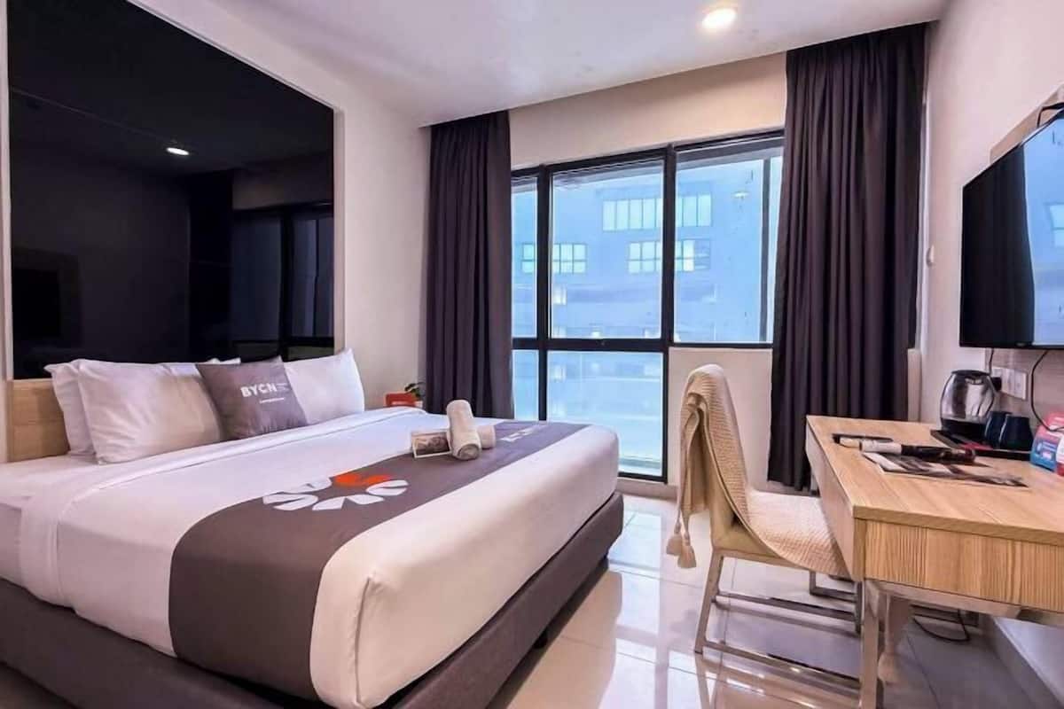 Desk, blackout drapes, iron/ironing board, bed sheets