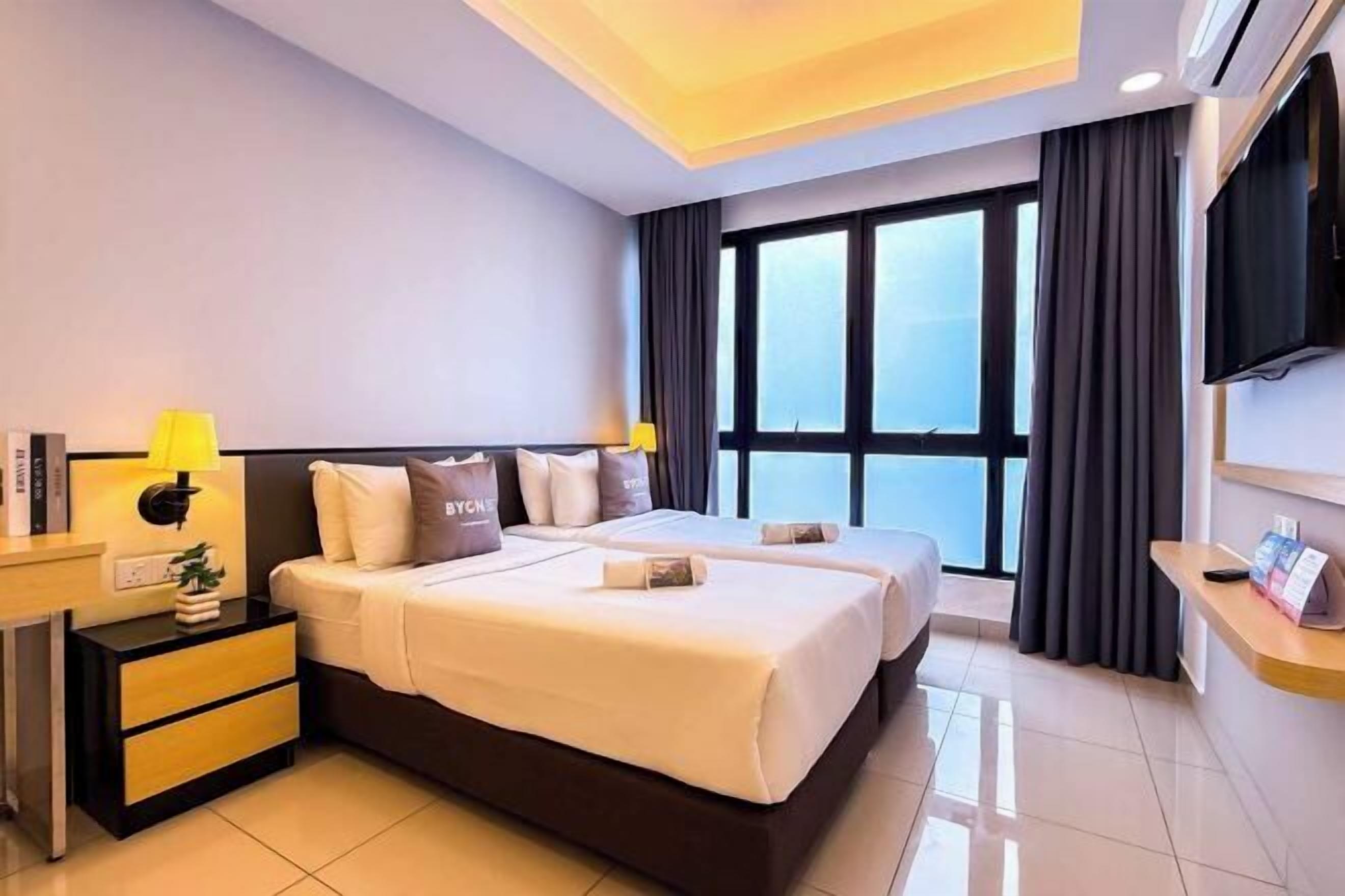 Desk, blackout drapes, iron/ironing board, bed sheets