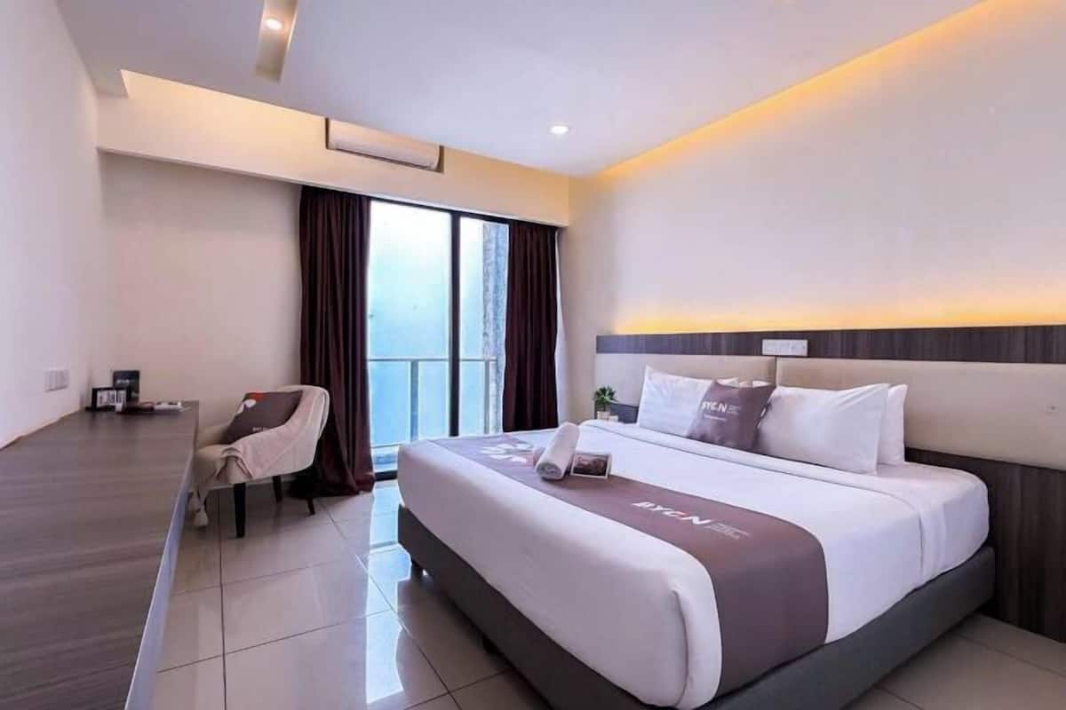 Desk, blackout drapes, iron/ironing board, bed sheets