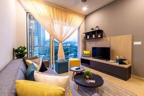 Comfort Apartment | Living area | 40-inch flat-screen TV with cable channels, TV