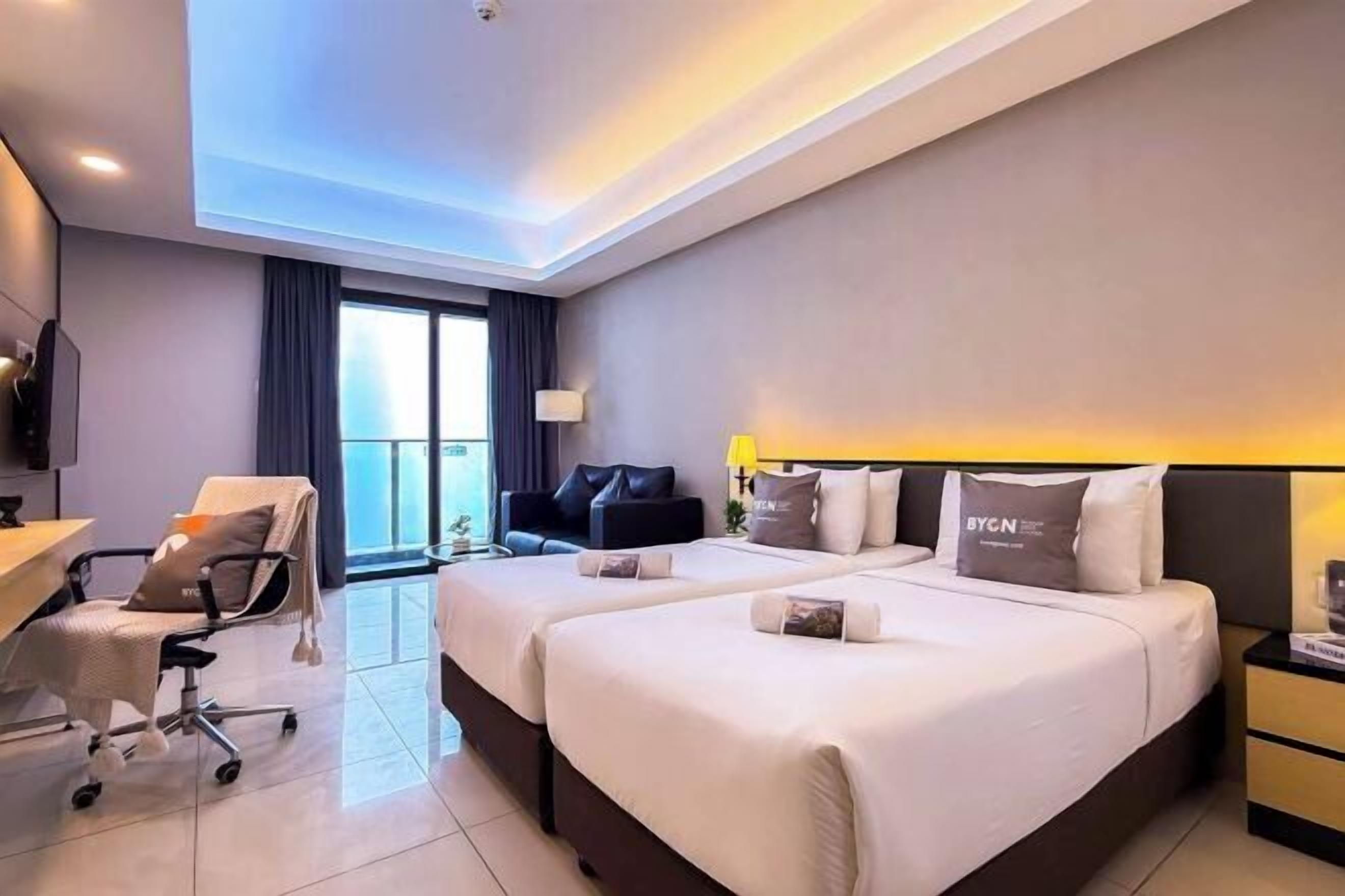 Desk, blackout drapes, iron/ironing board, bed sheets