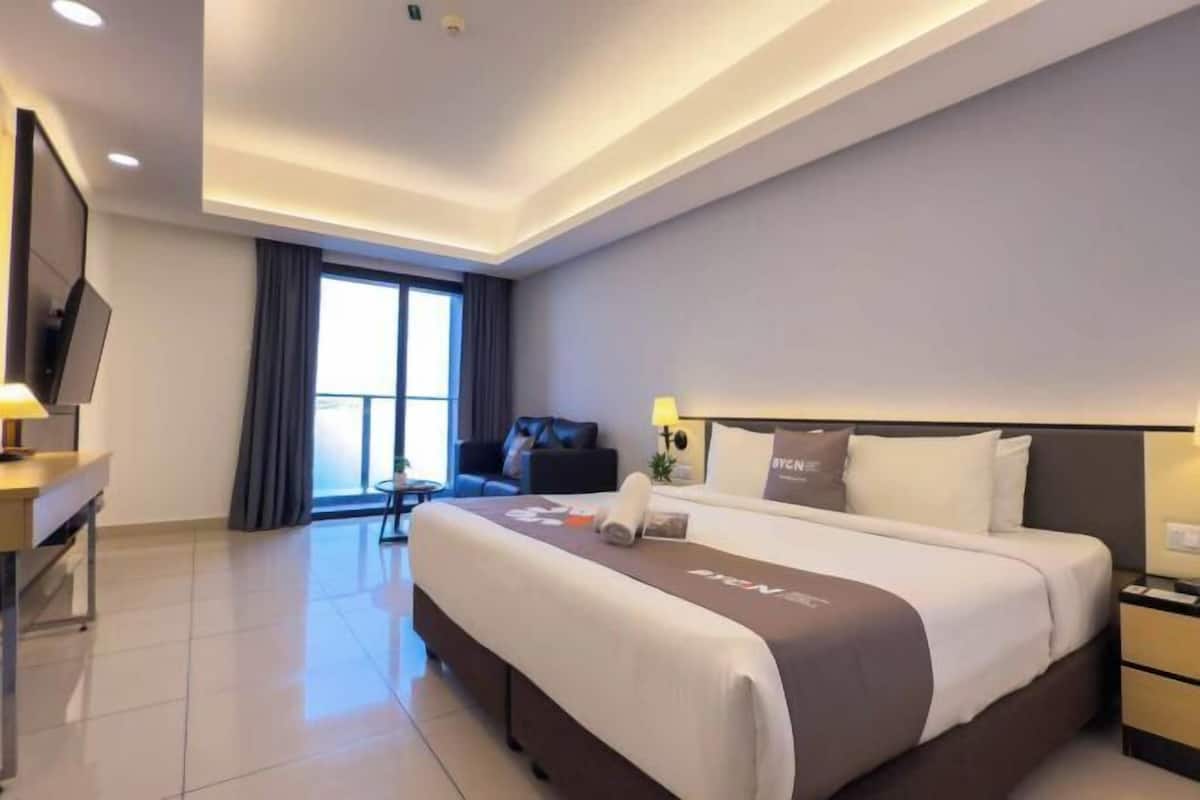 Desk, blackout drapes, iron/ironing board, bed sheets