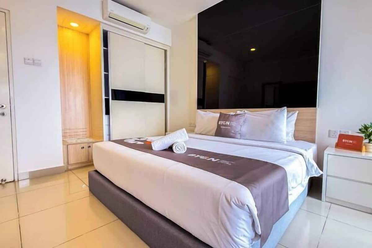 Desk, blackout drapes, iron/ironing board, bed sheets