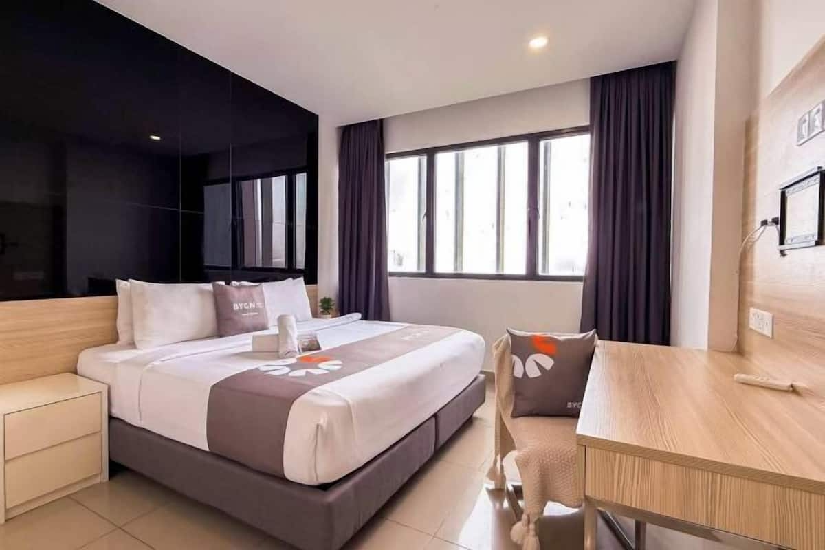 Desk, blackout drapes, iron/ironing board, bed sheets