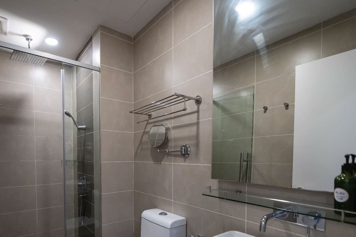 Shower, free toiletries, hair dryer, slippers