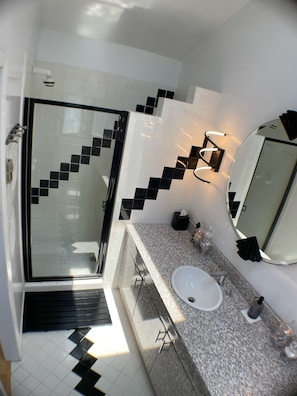 Combined shower/tub, hair dryer, towels, soap