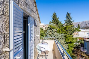 Lägenhet - 1 sovrum - balkong - utsikt mot trädgården | Strand