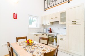 Apartment, 1 Bedroom, Balcony, Garden View | Dining - Cozy Duplex Apartment A2, in a Stone Built House, Sunset Beach Near Dubrovnik (Dubrovnik)