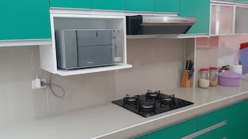 Fridge, microwave, stovetop, coffee/tea maker