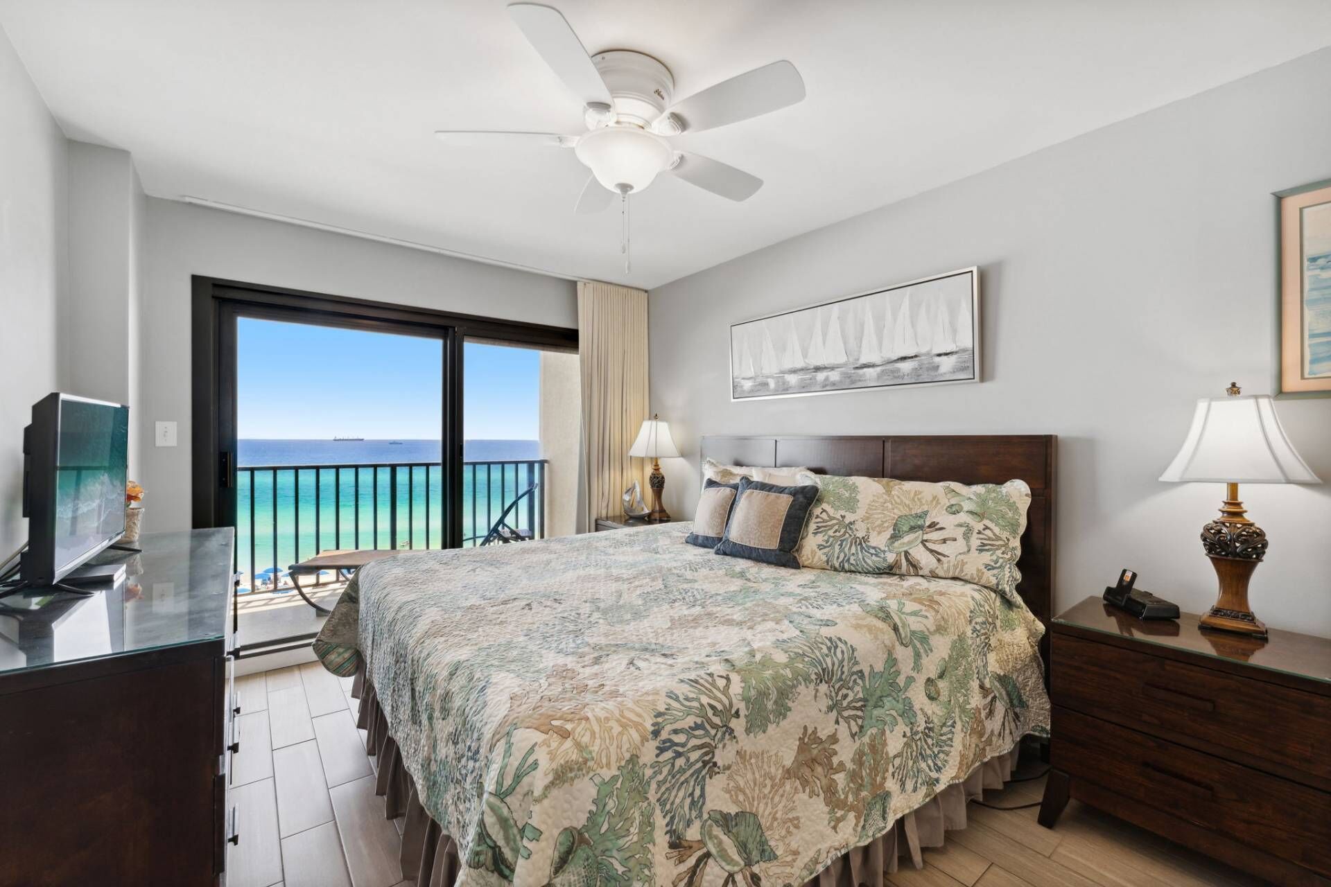 Beachfront condo on the quiet east end in a gated resort with kiddie pool, grills, and basketball