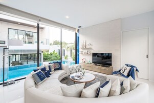 Exclusive Villa, 3 Bedrooms | Living area | TV