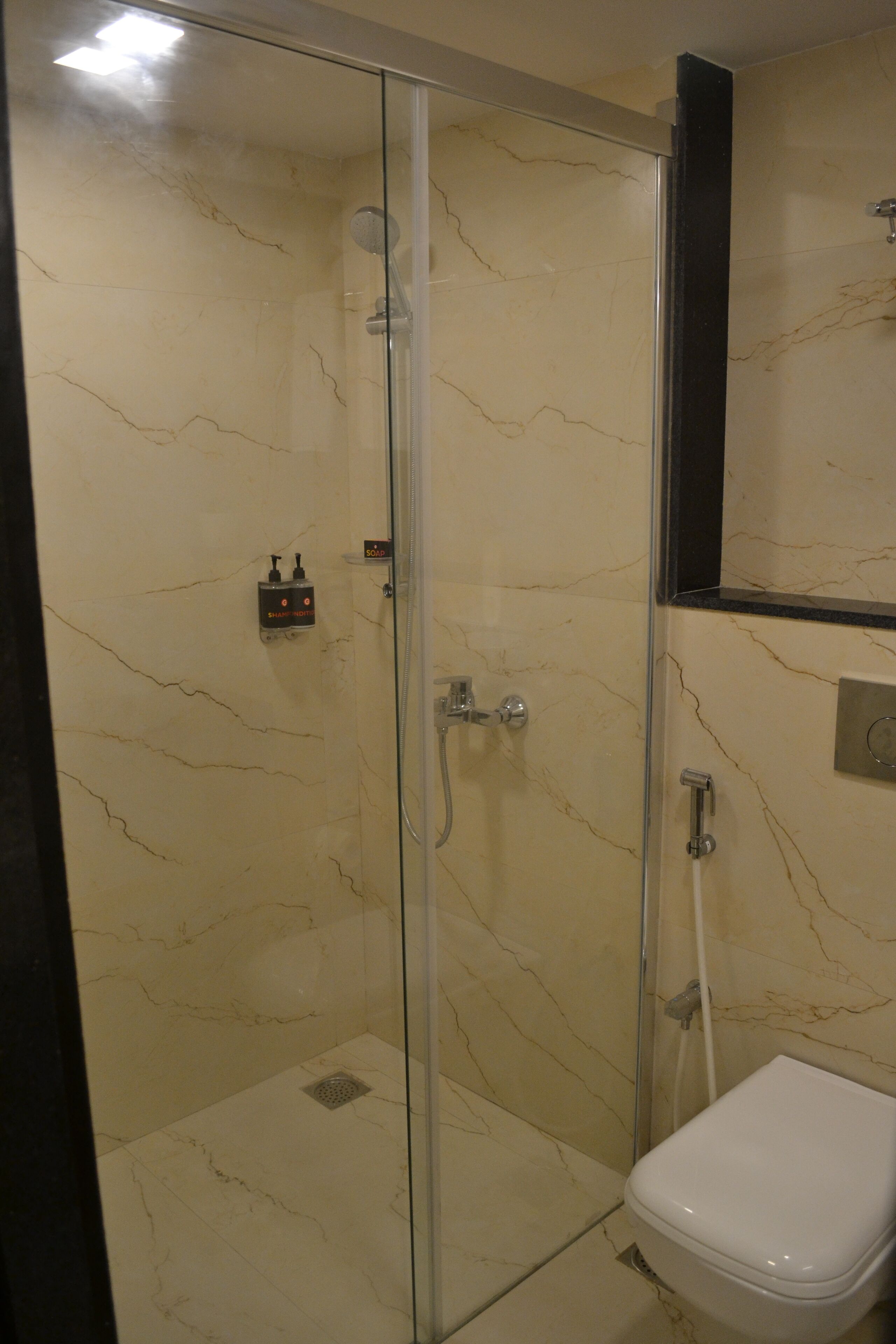 luxe room | bathroom | shower, free toiletries, bathrobes, towels