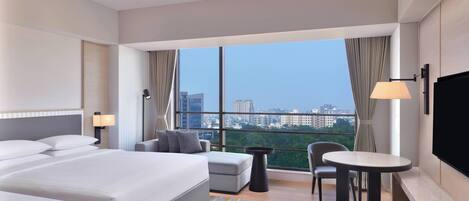 Premium bedding, down comforters, minibar, in-room safe