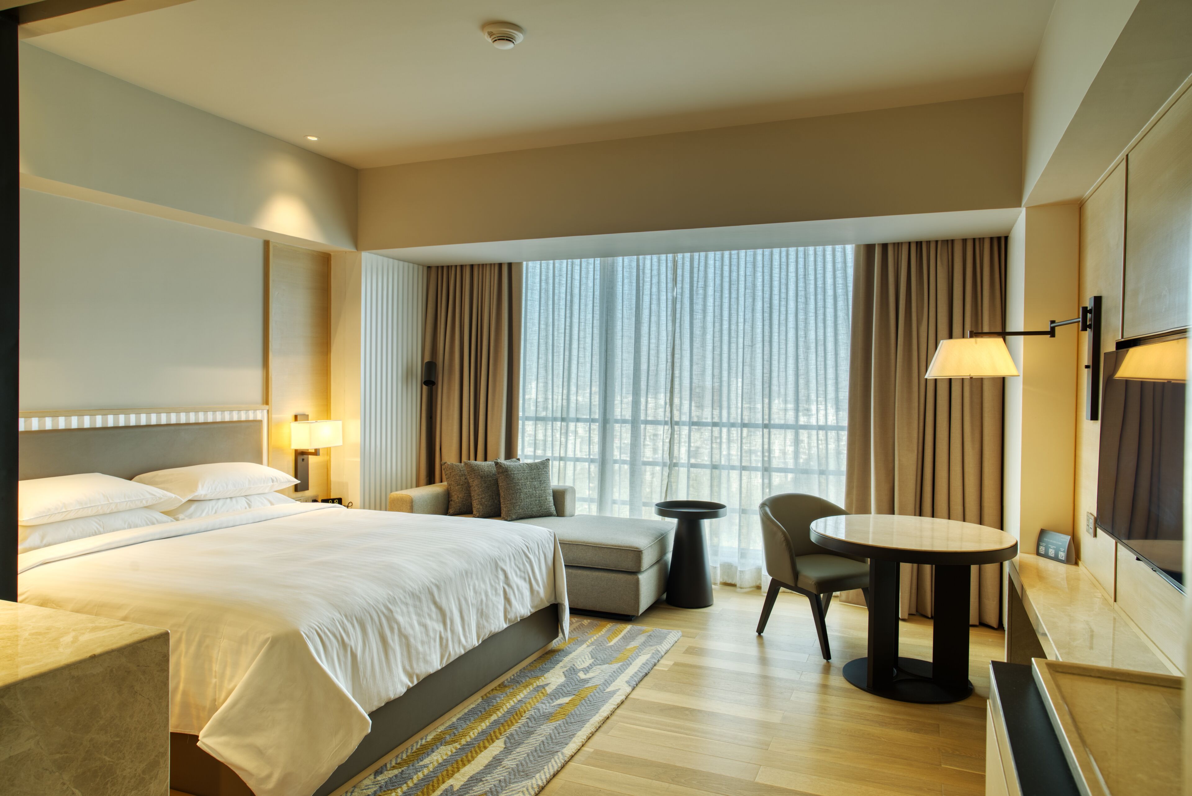 premium bedding, down duvets, minibar, in-room safe