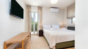Deluxe Apartment, 4 Bedrooms, Terrace, Pool View | Desk, iron/ironing board, free WiFi, bed sheets