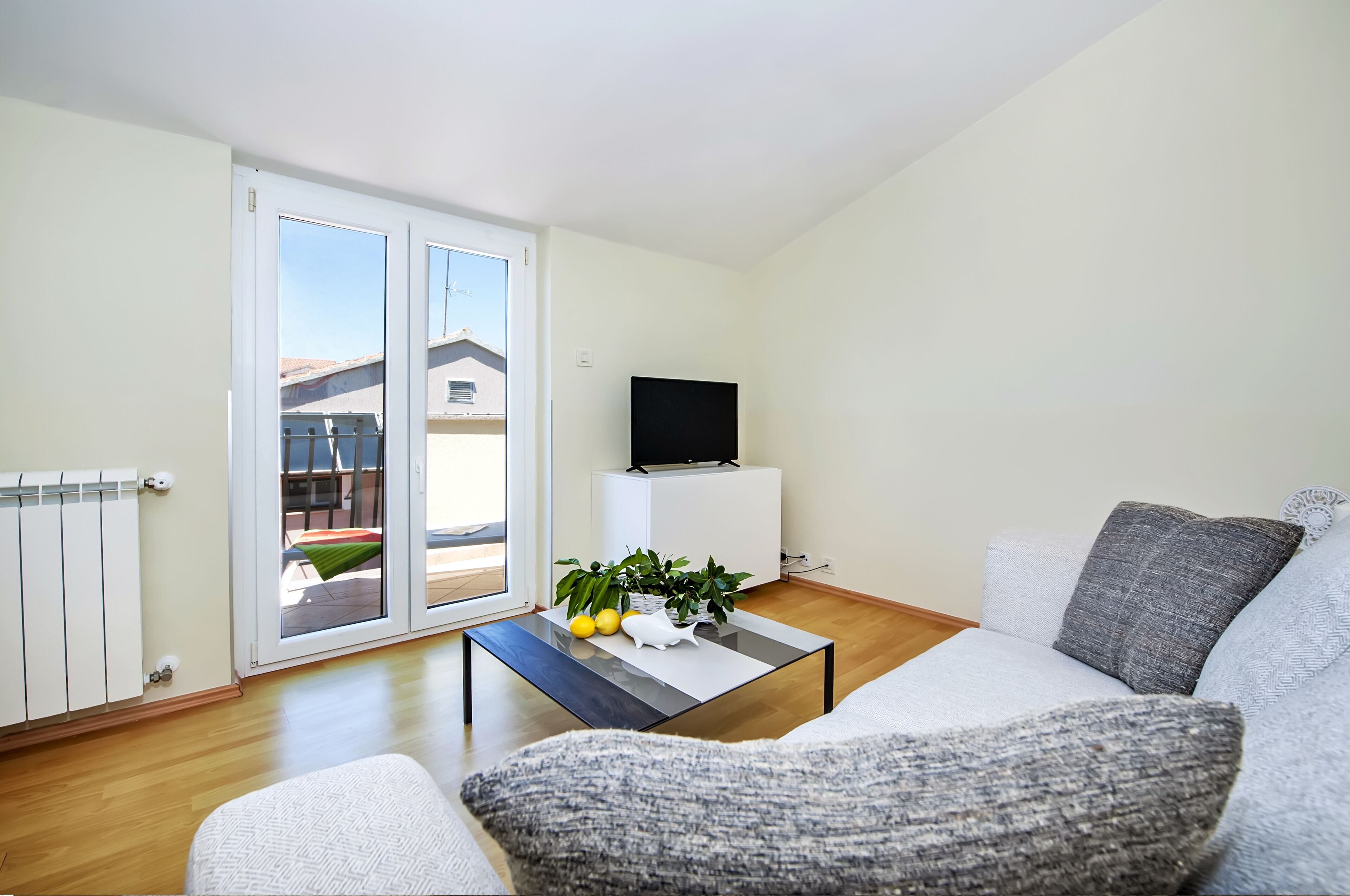 Deluxe Apartment, 3 Bedrooms, Balcony, Pool View | Living area | Flat-screen TV