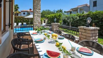 Deluxe Apartment, 4 Bedrooms, Terrace, Pool View | Terrace/patio