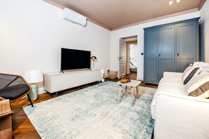 Design Apartment, 2 Bedrooms | Living area | LCD TV