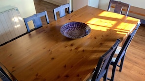 Enjoy meals in this cozy dining area with a large table and six chairs.