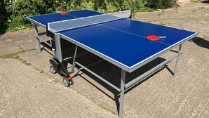 Two portable ping pong tables with wheels, set up outdoors on a concrete surface. - Hayloft Cottage - Devon (Sidmouth)