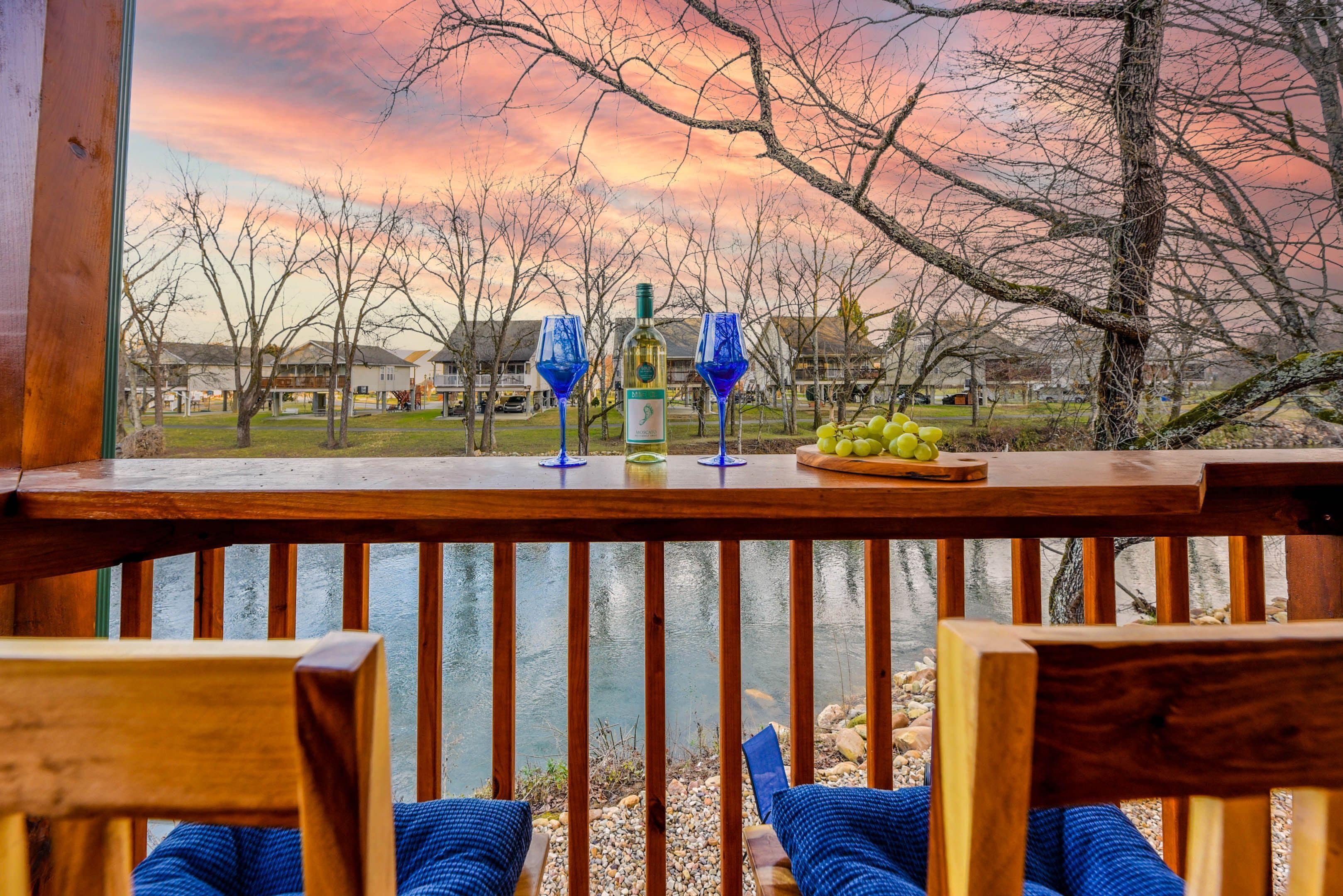 Enjoy a glass wine overlooking the river