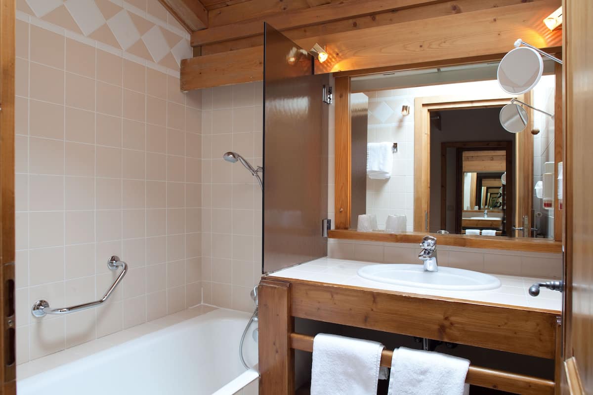 hair dryer, slippers, towels