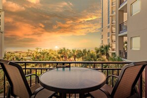 Outdoor dining - Unwind at High Tide Haven: Beachfront Condo with Resort Pools and Gulf Views (Miramar Beach)