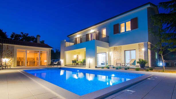 A two-story house with a swimming pool, stone exterior, and outdoor seating area. - Villa Cedar with large swimming pool and summer kitchen (Gostinjac (Krk))