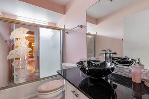 Shower, hair dryer, towels, toilet paper