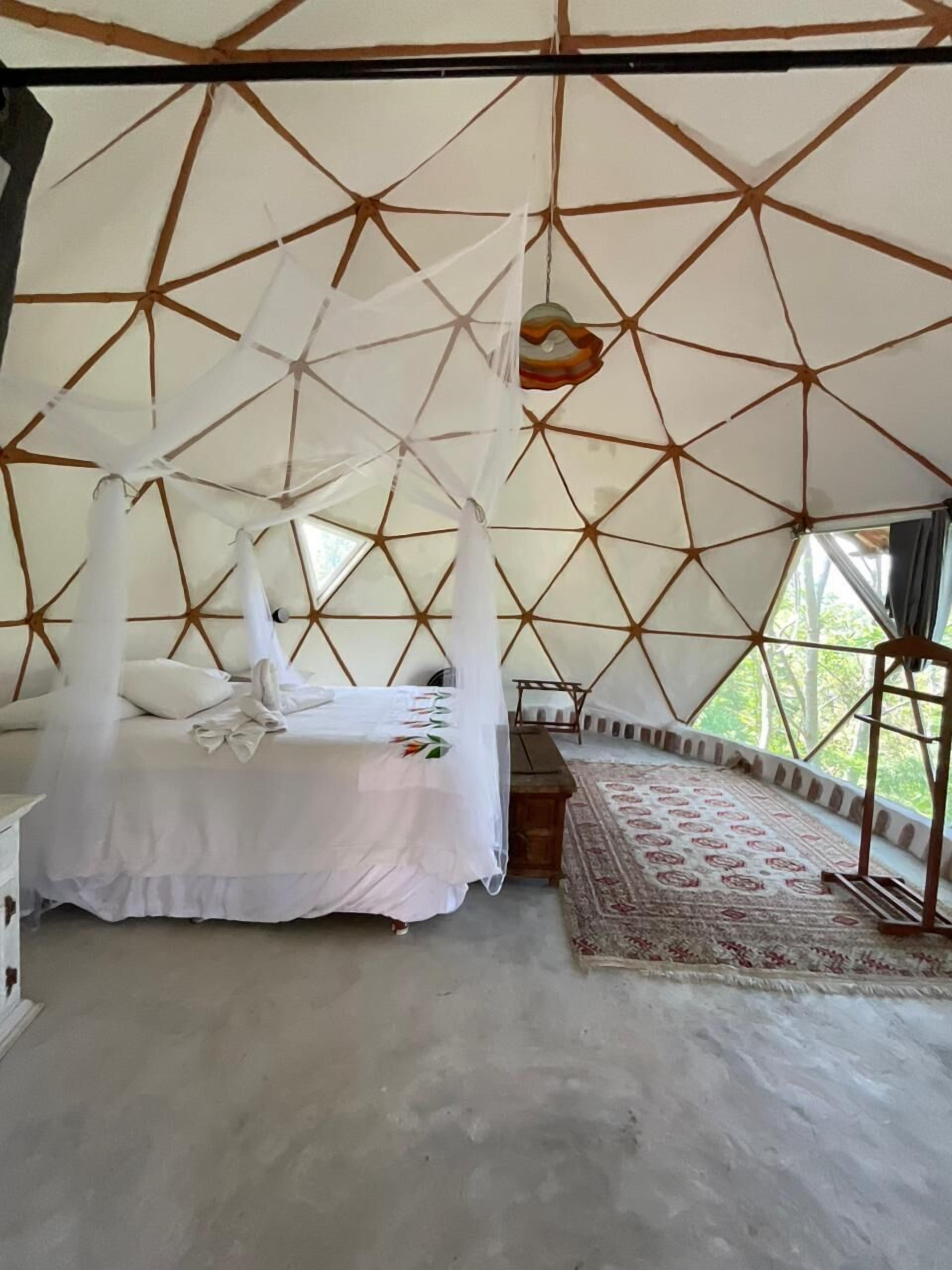 Design Tent | Premium bedding, down comforters, individually decorated, bed sheets