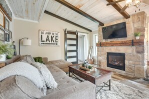 TV, fireplace - Tranquil Lakefront Cabin: Fire Pit, Grill & Patio (Tomahawk)