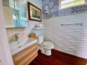 Shower, hair dryer, towels, soap