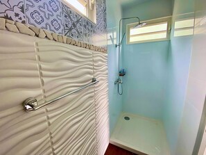 Shower, hair dryer, towels, soap