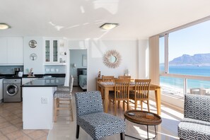 Apartment (3 Bedrooms) | Living area | 32-inch flat-screen TV with digital channels, TV, Netflix - Ocean View A1101 by CTHA (Cape Town)