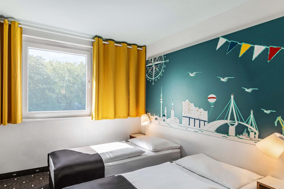 Chambre avec lits jumeaux | Literie hypoallergénique, bureau, chambres insonorisées, Wi-Fi gratuit