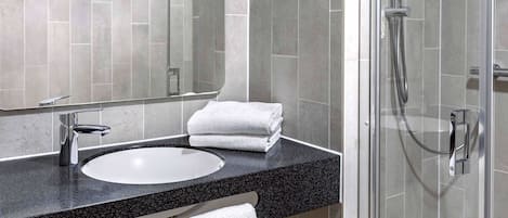 Shower, hair dryer, towels