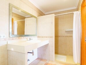 Bathtub, hair dryer, towels