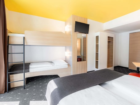 Escrivaninha, quartos Ć  prova de som, Wi-Fi de cortesia, roupa de cama