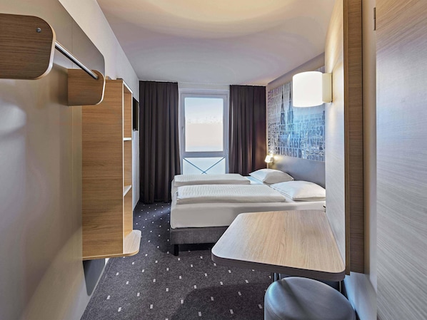 Allergikerbettwaren, Schreibtisch, schallisolierte Zimmer