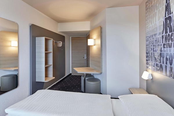 Literie hypoallergénique, bureau, chambres insonorisées, Wi-Fi gratuit