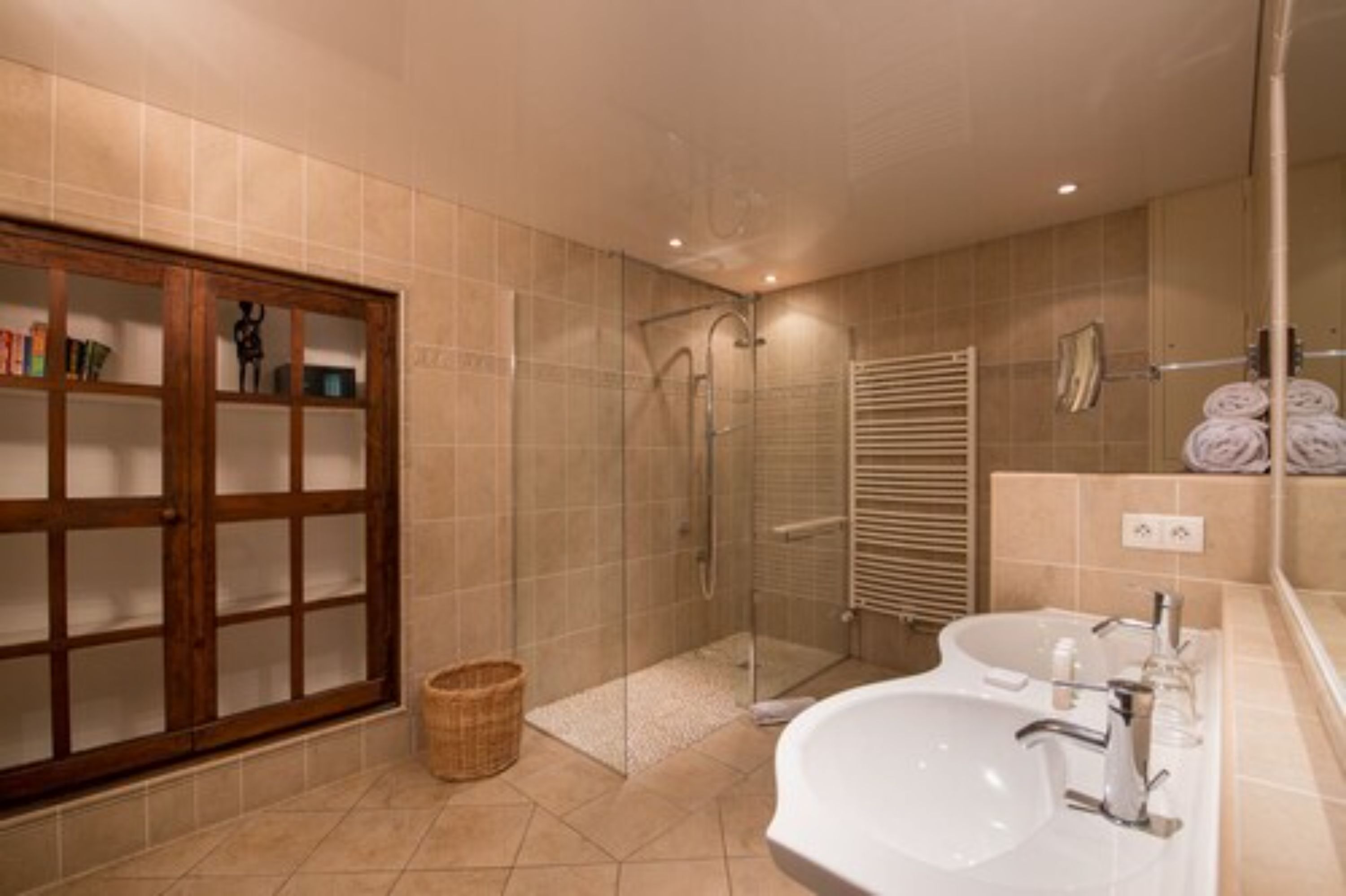 junior suite | bathroom | hair dryer, bathrobes, slippers, towels